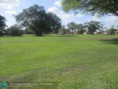 Spacious 2-Bedroom, 2-Bath Unit with Serene Golf Course Views! on Woodmont Country Club in Florida - for sale on GolfHomes.com, golf home, golf lot