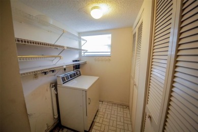 Spacious 2-Bedroom, 2-Bath Unit with Serene Golf Course Views! on Woodmont Country Club in Florida - for sale on GolfHomes.com, golf home, golf lot