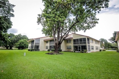 Spacious 2-Bedroom, 2-Bath Unit with Serene Golf Course Views! on Woodmont Country Club in Florida - for sale on GolfHomes.com, golf home, golf lot