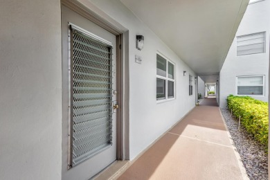 WONDERFUL 1ST FLOOR 1BR/ 1.5 BA UNIT IN NORMANDY D W/ IMPACT on Kings Point Golf -Flanders Way in Florida - for sale on GolfHomes.com, golf home, golf lot