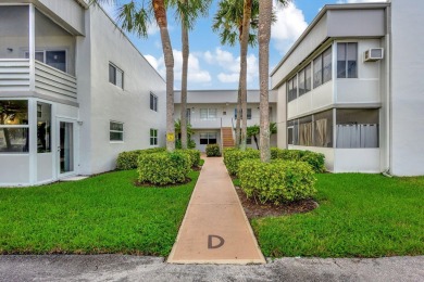 WONDERFUL 1ST FLOOR 1BR/ 1.5 BA UNIT IN NORMANDY D W/ IMPACT on Kings Point Golf -Flanders Way in Florida - for sale on GolfHomes.com, golf home, golf lot