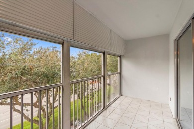 SPACIOUS UNIT WITH ACCORDIAN SHUTTERS AND A SCREENED BALCONY on Flamingo Lakes Country Club in Florida - for sale on GolfHomes.com, golf home, golf lot