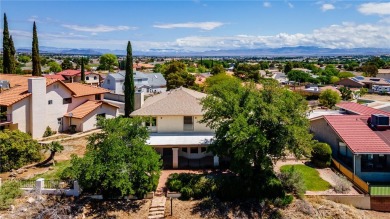 This 3285 livable sq. ft home backs up to the sceni 3rd hole of on Cerbat Cliffs Golf Course in Arizona - for sale on GolfHomes.com, golf home, golf lot