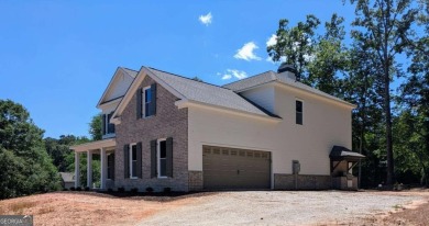 A golfer's paradise! This 4-bedroom, 3-bathroom home with 9' on Indian Creek Golf Club in Georgia - for sale on GolfHomes.com, golf home, golf lot