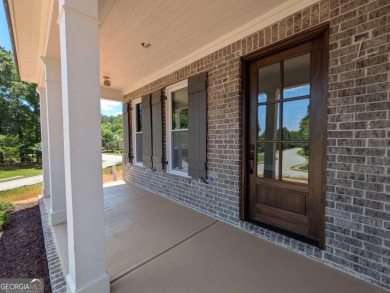 A golfer's paradise! This 4-bedroom, 3-bathroom home with 9' on Indian Creek Golf Club in Georgia - for sale on GolfHomes.com, golf home, golf lot