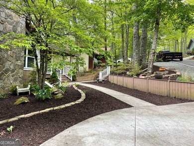 Welcome to 334 Eagle Circle in the picturesque mountain on Sky Valley Resort and Country Club in Georgia - for sale on GolfHomes.com, golf home, golf lot