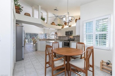 Rarely available end-unit condo with attached garage offering on Imperial Golf Club in Florida - for sale on GolfHomes.com, golf home, golf lot