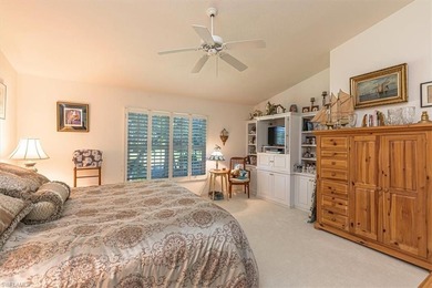Rarely available end-unit condo with attached garage offering on Imperial Golf Club in Florida - for sale on GolfHomes.com, golf home, golf lot