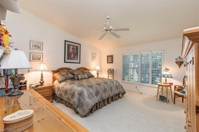 Rarely available end-unit condo with attached garage offering on Imperial Golf Club in Florida - for sale on GolfHomes.com, golf home, golf lot