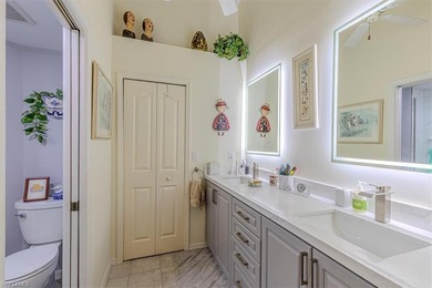 Rarely available end-unit condo with attached garage offering on Imperial Golf Club in Florida - for sale on GolfHomes.com, golf home, golf lot