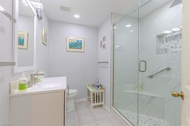 Rarely available end-unit condo with attached garage offering on Imperial Golf Club in Florida - for sale on GolfHomes.com, golf home, golf lot