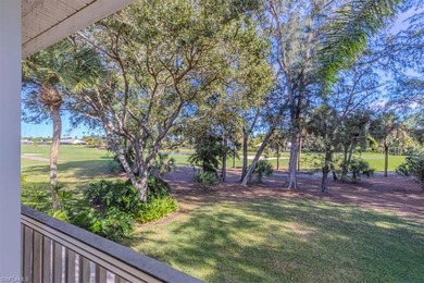 Rarely available end-unit condo with attached garage offering on Imperial Golf Club in Florida - for sale on GolfHomes.com, golf home, golf lot