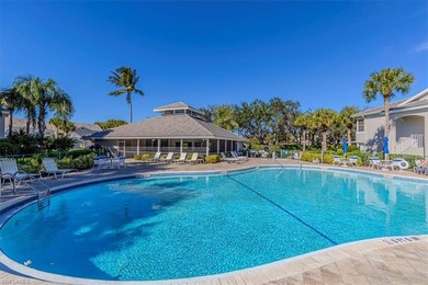 Rarely available end-unit condo with attached garage offering on Imperial Golf Club in Florida - for sale on GolfHomes.com, golf home, golf lot