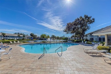 Rarely available end-unit condo with attached garage offering on Imperial Golf Club in Florida - for sale on GolfHomes.com, golf home, golf lot