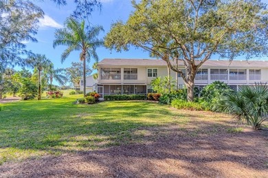 Rarely available end-unit condo with attached garage offering on Imperial Golf Club in Florida - for sale on GolfHomes.com, golf home, golf lot