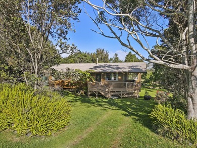 This recently remodeled two bedroom, two bath cabin is a on Volcano Golf and Country Club in Hawaii - for sale on GolfHomes.com, golf home, golf lot
