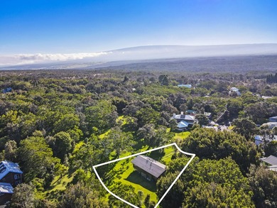 This recently remodeled two bedroom, two bath cabin is a on Volcano Golf and Country Club in Hawaii - for sale on GolfHomes.com, golf home, golf lot