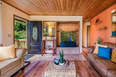 This recently remodeled two bedroom, two bath cabin is a on Volcano Golf and Country Club in Hawaii - for sale on GolfHomes.com, golf home, golf lot