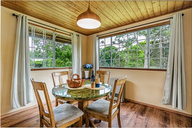 This recently remodeled two bedroom, two bath cabin is a on Volcano Golf and Country Club in Hawaii - for sale on GolfHomes.com, golf home, golf lot