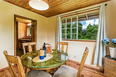This recently remodeled two bedroom, two bath cabin is a on Volcano Golf and Country Club in Hawaii - for sale on GolfHomes.com, golf home, golf lot