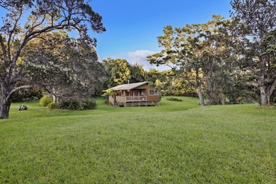 This recently remodeled two bedroom, two bath cabin is a on Volcano Golf and Country Club in Hawaii - for sale on GolfHomes.com, golf home, golf lot