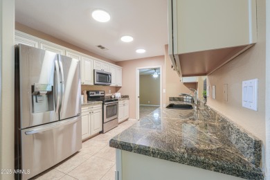 Located in Sunland Springs Village, this 3 bed, 2 bath home on Sunland Springs Golf Course  in Arizona - for sale on GolfHomes.com, golf home, golf lot