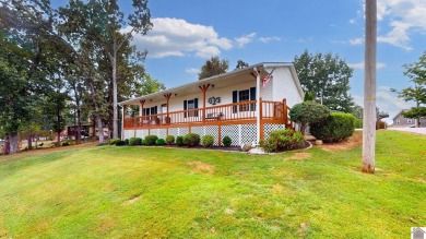 Welcome to this dreamy home, reminiscent of a Better Homes on Kentucky Dam Village State Resort Park Golf Course in Kentucky - for sale on GolfHomes.com, golf home, golf lot