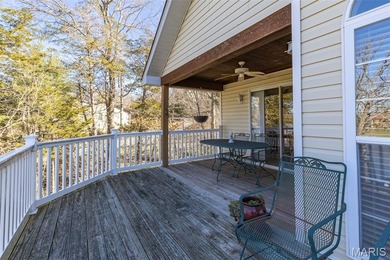 Welcome to the lake! This one is a turnkey waterfront lake house on Raintree Country Club in Missouri - for sale on GolfHomes.com, golf home, golf lot