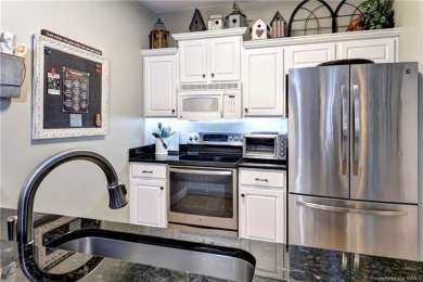 Perfection! One of only a few units where you have no one above on Williamsburg National Golf Club in Virginia - for sale on GolfHomes.com, golf home, golf lot