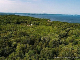 This property offers 33 acres of land with opportunity for views on Northport Golf Club in Maine - for sale on GolfHomes.com, golf home, golf lot