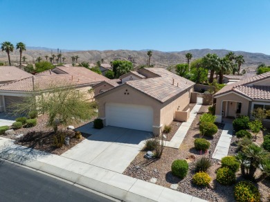 Lovely extended LANAI model on beautiful park-like large lot on Mountain Vista Golf Course At Sun City Palm Desert in California - for sale on GolfHomes.com, golf home, golf lot