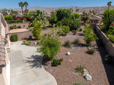 Lovely extended LANAI model on beautiful park-like large lot on Mountain Vista Golf Course At Sun City Palm Desert in California - for sale on GolfHomes.com, golf home, golf lot