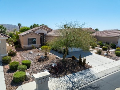 Lovely extended LANAI model on beautiful park-like large lot on Mountain Vista Golf Course At Sun City Palm Desert in California - for sale on GolfHomes.com, golf home, golf lot