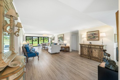 Enjoy panoramic golf course views of 13 & 14 North from this on Quail Ridge Golf Course and Country Club in Florida - for sale on GolfHomes.com, golf home, golf lot