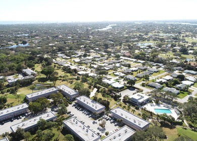 Freshly painted 2/2 second floor condo in the 55+ community of on The Little Club in Florida - for sale on GolfHomes.com, golf home, golf lot