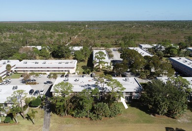 Freshly painted 2/2 second floor condo in the 55+ community of on The Little Club in Florida - for sale on GolfHomes.com, golf home, golf lot