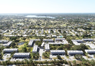 Freshly painted 2/2 second floor condo in the 55+ community of on The Little Club in Florida - for sale on GolfHomes.com, golf home, golf lot