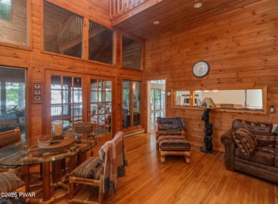 Privately set Lakefront Retreat with three levels of abundant on Lords Valley Country Club, Inc in Pennsylvania - for sale on GolfHomes.com, golf home, golf lot