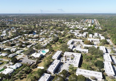 Freshly painted 2/2 second floor condo in the 55+ community of on The Little Club in Florida - for sale on GolfHomes.com, golf home, golf lot
