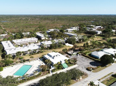 Freshly painted 2/2 second floor condo in the 55+ community of on The Little Club in Florida - for sale on GolfHomes.com, golf home, golf lot