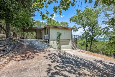 This lake view home on Table Rock Lake is perfect for those who on Holiday Island Executive Golf Course in Arkansas - for sale on GolfHomes.com, golf home, golf lot