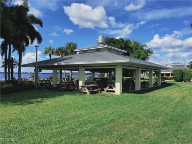Experience Stunning TOP-FLOOR, LAKE and GOLF VIEWS from this on The Landings Yacht, Golf and Tennis Club in Florida - for sale on GolfHomes.com, golf home, golf lot