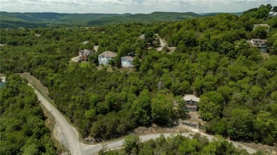 This lake view home on Table Rock Lake is perfect for those who on Holiday Island Executive Golf Course in Arkansas - for sale on GolfHomes.com, golf home, golf lot