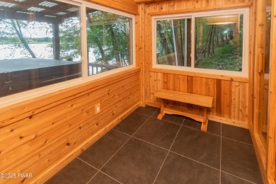 Privately set Lakefront Retreat with three levels of abundant on Lords Valley Country Club, Inc in Pennsylvania - for sale on GolfHomes.com, golf home, golf lot