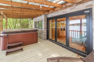 Privately set Lakefront Retreat with three levels of abundant on Lords Valley Country Club, Inc in Pennsylvania - for sale on GolfHomes.com, golf home, golf lot