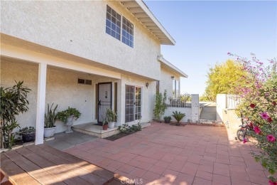 This wonderful home is nestled amidst gently rolling hills in a on Hansen Dam Golf Course in California - for sale on GolfHomes.com, golf home, golf lot