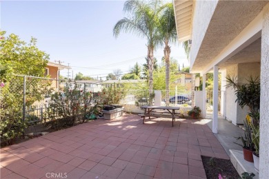 This wonderful home is nestled amidst gently rolling hills in a on Hansen Dam Golf Course in California - for sale on GolfHomes.com, golf home, golf lot