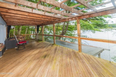 Privately set Lakefront Retreat with three levels of abundant on Lords Valley Country Club, Inc in Pennsylvania - for sale on GolfHomes.com, golf home, golf lot