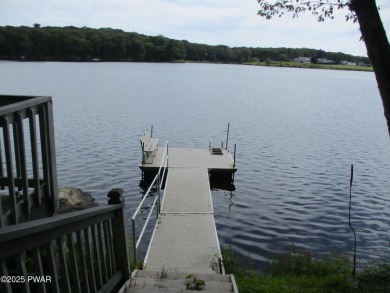 Privately set Lakefront Retreat with three levels of abundant on Lords Valley Country Club, Inc in Pennsylvania - for sale on GolfHomes.com, golf home, golf lot