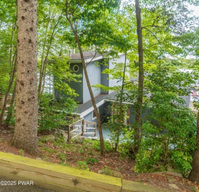 Privately set Lakefront Retreat with three levels of abundant on Lords Valley Country Club, Inc in Pennsylvania - for sale on GolfHomes.com, golf home, golf lot